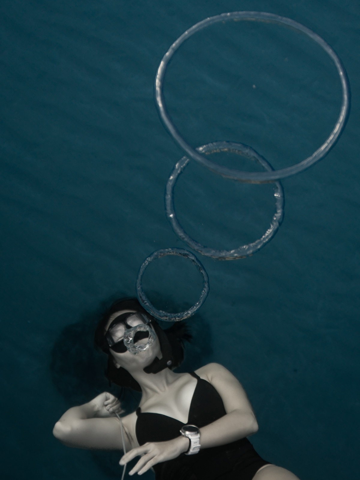 Freediving and mermaid photography in an indoor pool