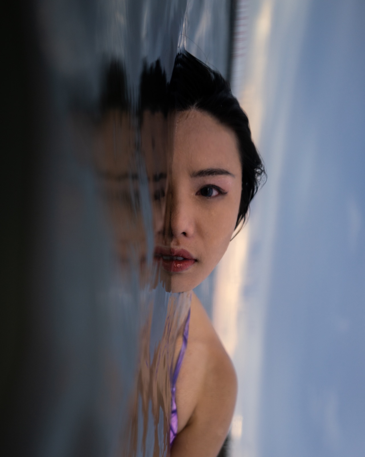 Freediving and mermaid photography in an indoor pool