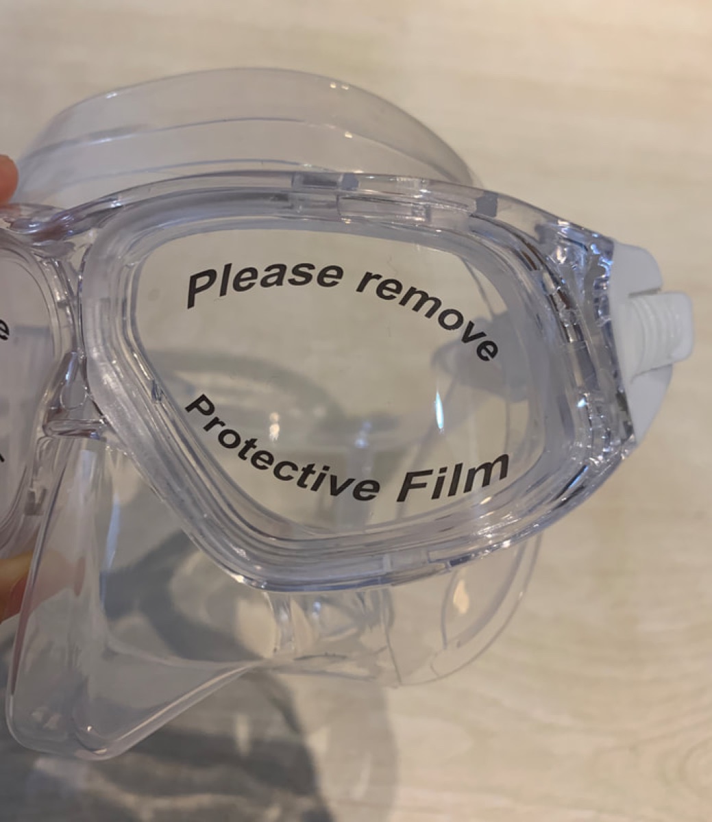 A new mask lens printed with Please remove protective film